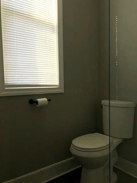 bathroom featuring toilet