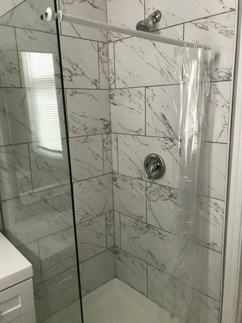 bathroom with walk in shower