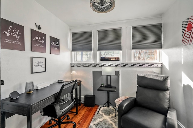 office featuring a healthy amount of sunlight and wood-type flooring