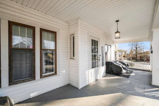 wooden deck featuring grilling area