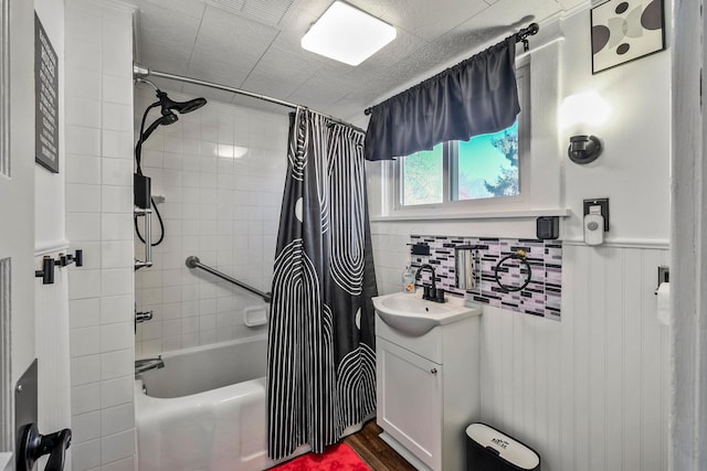 bathroom with shower / bath combo with shower curtain, vanity, and hardwood / wood-style floors