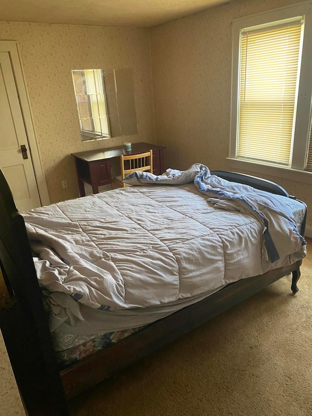 bedroom featuring carpet flooring