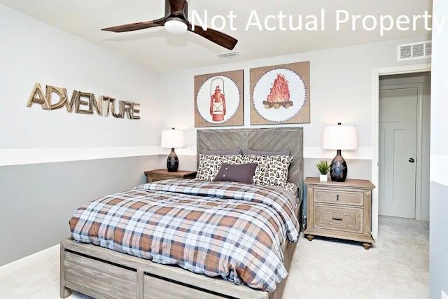 bedroom featuring ceiling fan and light carpet