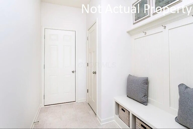 mudroom featuring baseboards