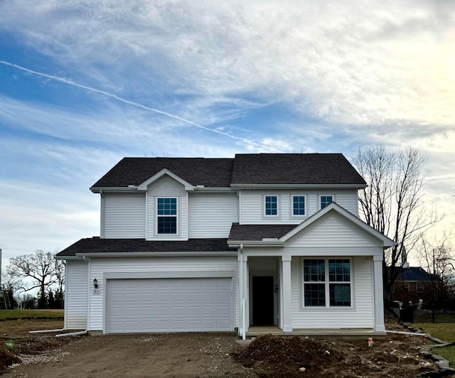 view of front of property with a garage