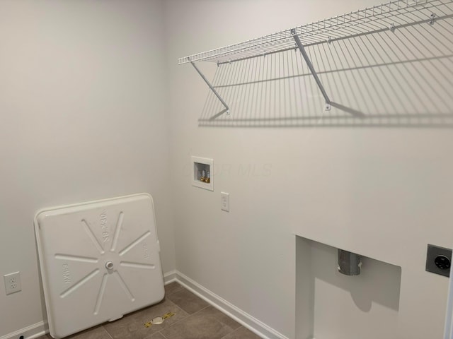 laundry room with washer hookup, hookup for an electric dryer, and tile patterned flooring