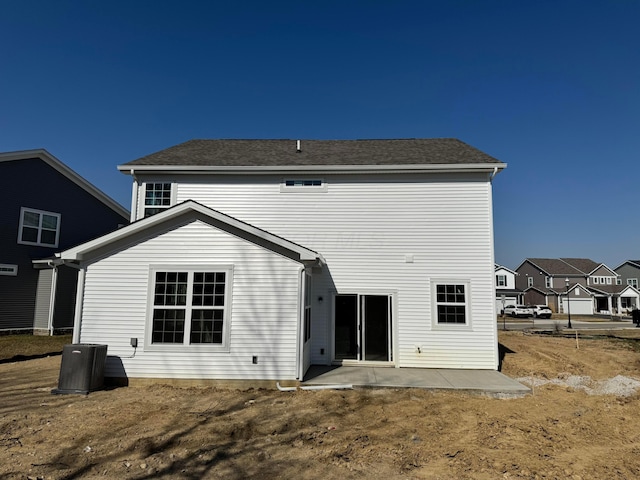 back of property with a patio area