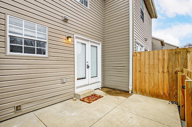 doorway to property featuring a patio and french doors