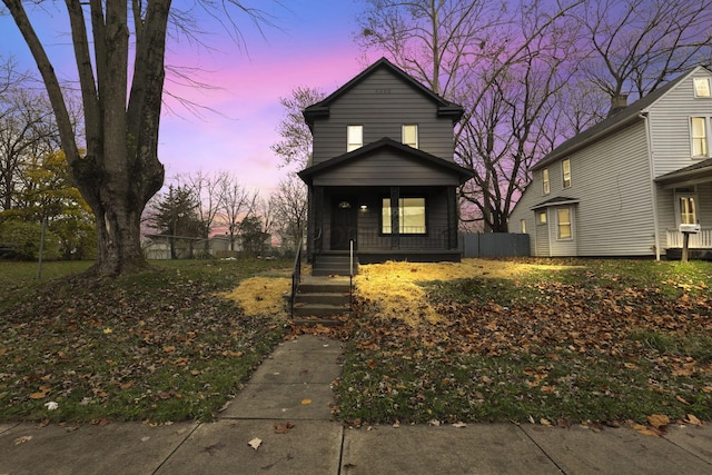 front of property featuring covered porch