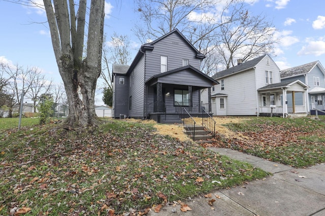 view of front property featuring covered porch