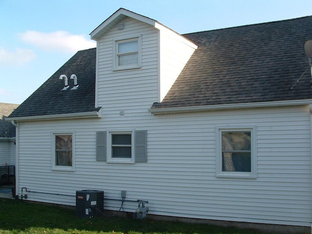 view of home's exterior with central AC