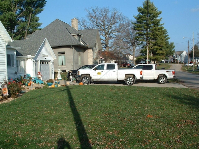 view of yard with a garage