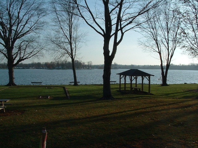 property view of water with a gazebo