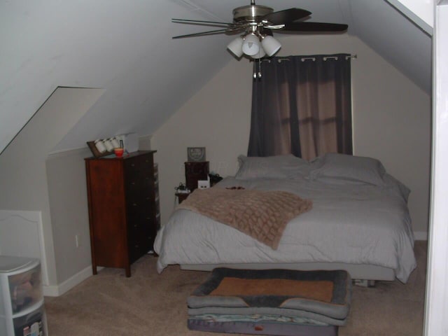 bedroom featuring ceiling fan, light carpet, and lofted ceiling