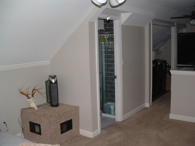 interior space with vaulted ceiling and ceiling fan