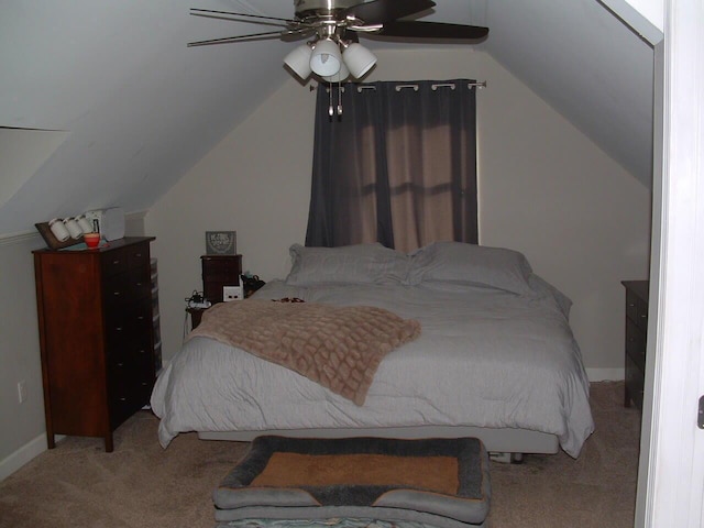 bedroom featuring ceiling fan, light carpet, and vaulted ceiling