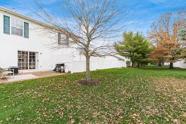 view of yard featuring a patio area and central AC