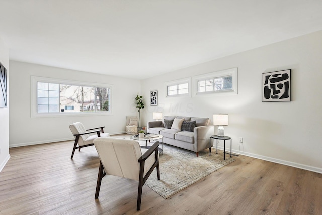 living room with light hardwood / wood-style floors