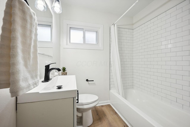 full bathroom with toilet, vanity, shower / bath combo, and hardwood / wood-style flooring