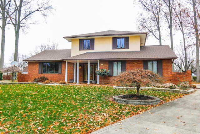 front of property featuring a front lawn