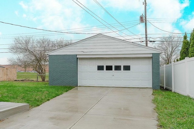 garage with a lawn