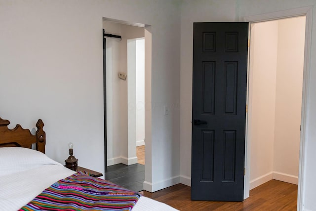 bedroom featuring dark hardwood / wood-style floors