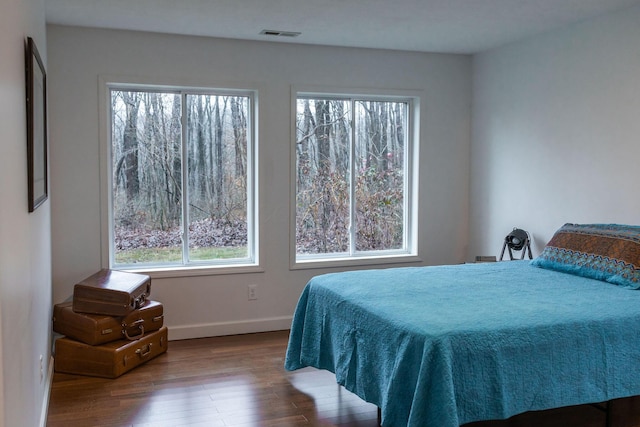 bedroom featuring hardwood / wood-style flooring