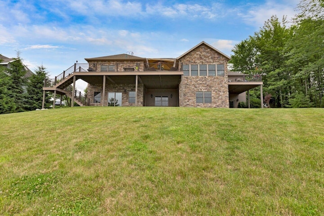 back of property featuring a lawn and a deck