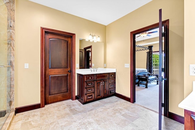 bathroom featuring vanity, ceiling fan, and an enclosed shower