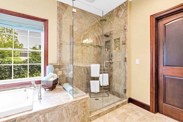 bathroom with separate shower and tub