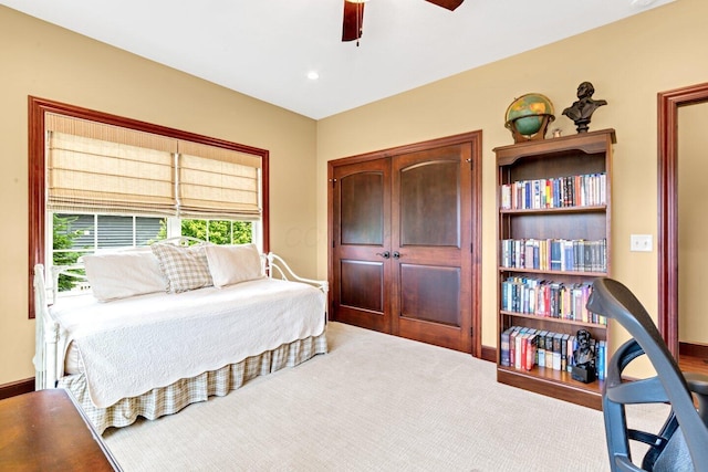 bedroom with carpet flooring and ceiling fan