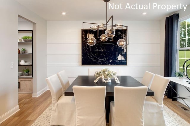 dining area featuring light hardwood / wood-style floors