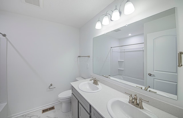bathroom featuring a sink, visible vents, toilet, and marble finish floor