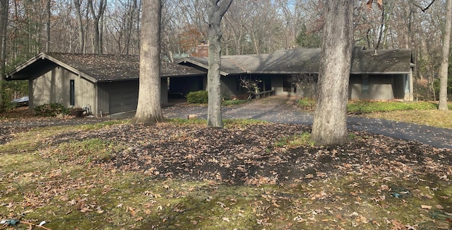 view of side of property with a garage