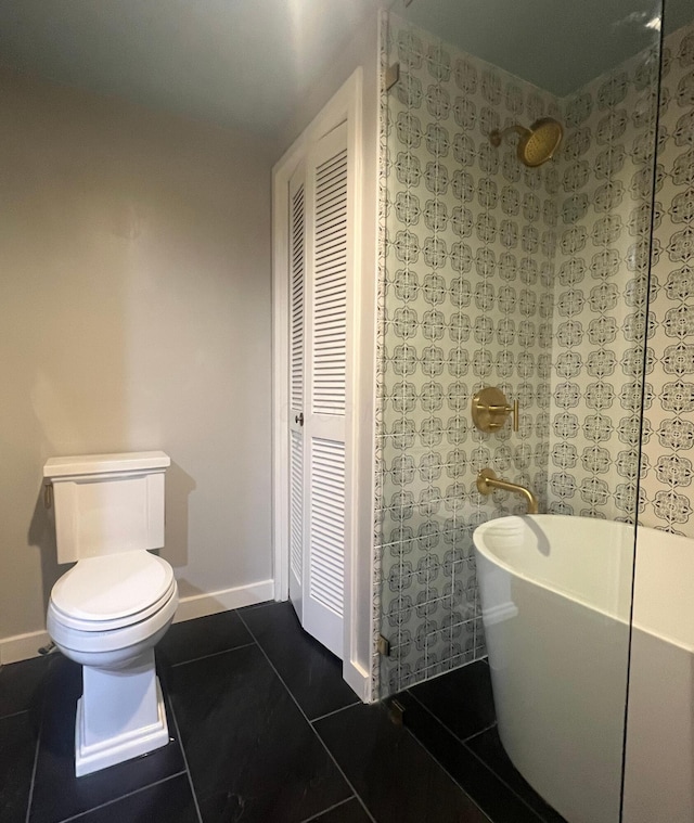 bathroom featuring toilet, a bathtub, and tile patterned flooring