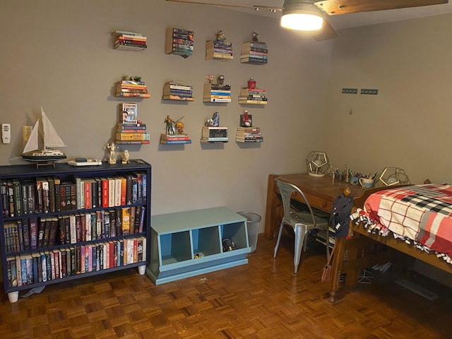 bedroom with parquet flooring and ceiling fan