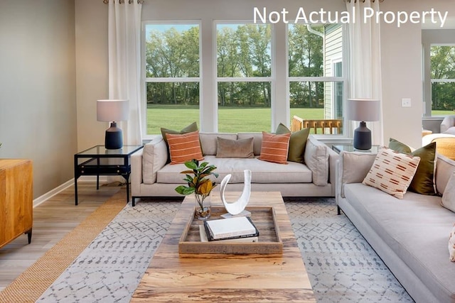 sunroom / solarium featuring plenty of natural light