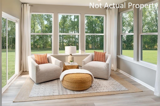 sunroom / solarium with plenty of natural light