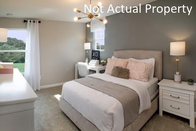 bedroom with light carpet and a notable chandelier