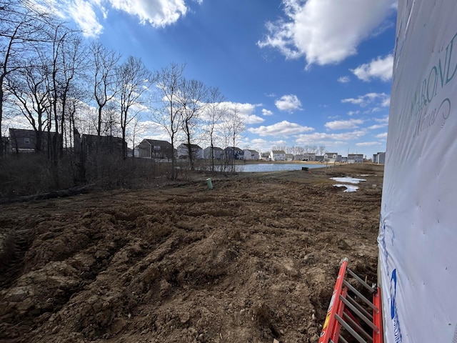 view of yard featuring a water view