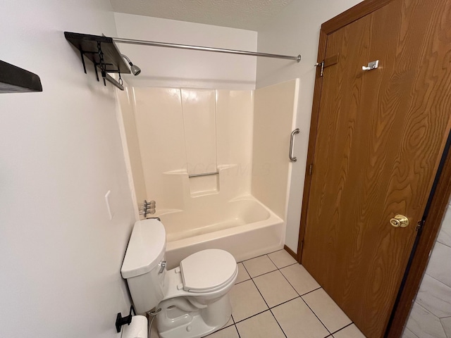 bathroom featuring shower / tub combination, tile patterned flooring, a textured ceiling, and toilet