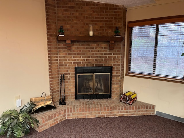 details featuring carpet flooring and a fireplace