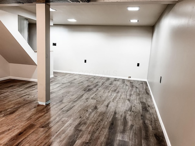 basement featuring hardwood / wood-style floors