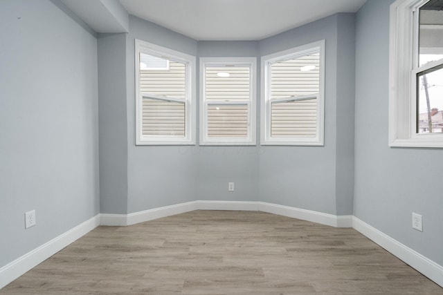 empty room featuring light hardwood / wood-style floors