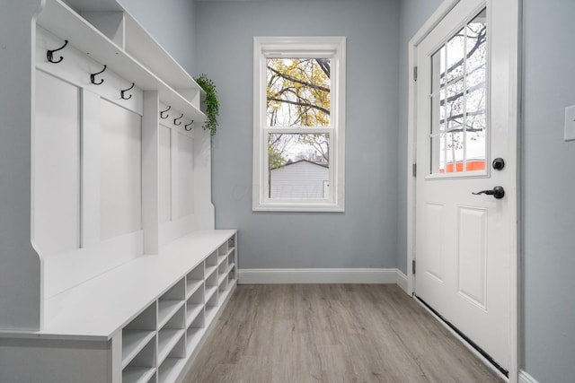 mudroom with light hardwood / wood-style flooring