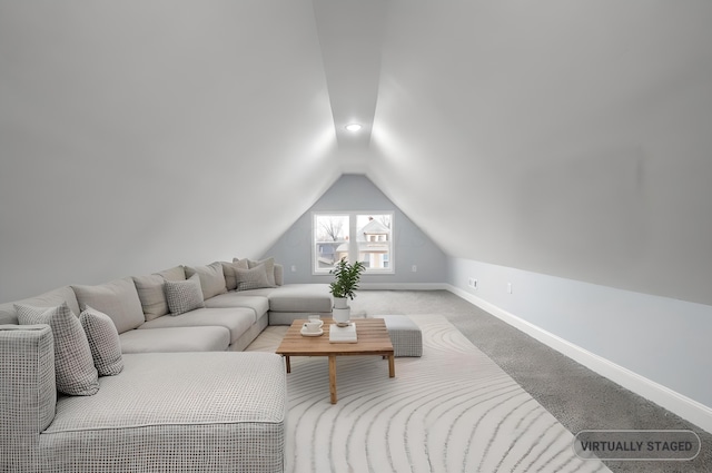 living room with carpet floors and lofted ceiling