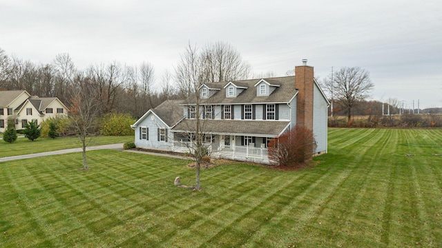 view of front of house featuring a porch and a front lawn