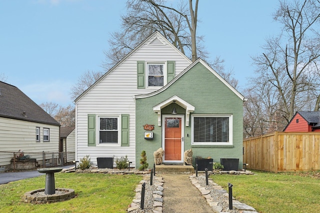 view of front of house with a front lawn