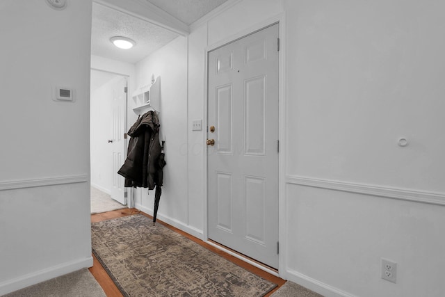 119 Skyline Dr, South Bloomfield, OH 43103 - foyer with baseboards and a textured ceiling