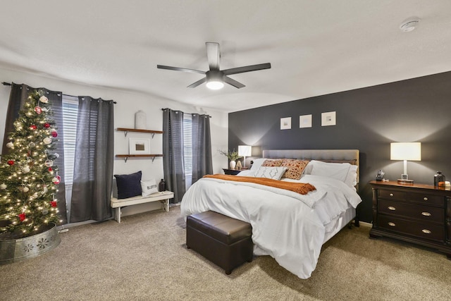 bedroom with ceiling fan and carpet